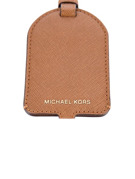 michael kors leather luggage tag|Michael Kors bag with airplanes.